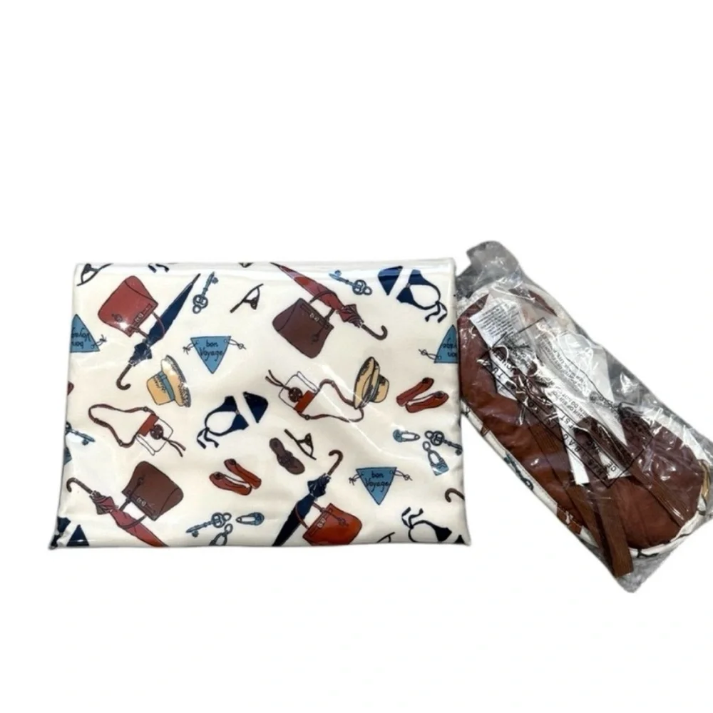Tory Burch Ivory Beatu Accessory Pouch and sleep mask set